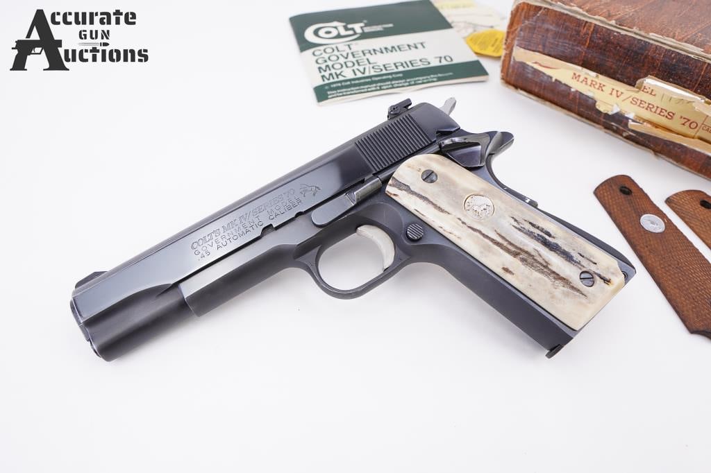 Colt Government Model .45 Auto "1978": Manufactured in 1978 as per serial number. Beautiful deep blued finish, standard A1 configuration but with a low profile adjustable target sights, stag style grips with Colt medallion and original woo