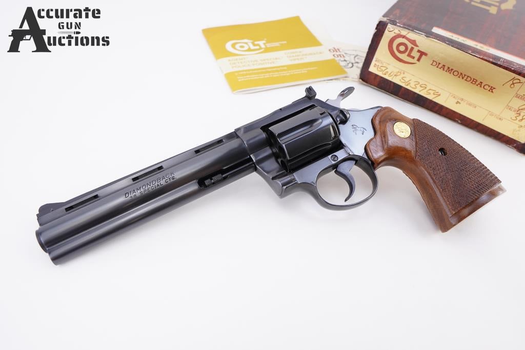 Colt Diamondback .38 SPL "1981": Manufactured in 1981 as per serial number. This Stunning!!! snake gun features a 6" ventilated barrel with full length ejector shroud. Rear adjustable notch with front ramp sights. Left side of the ba