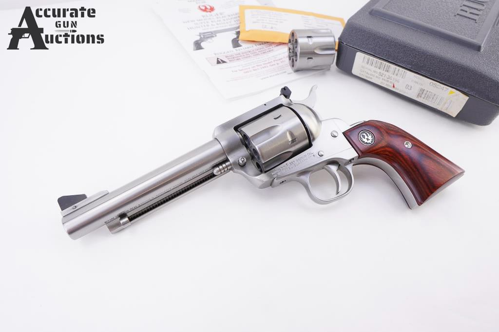 Ruger New Model Blackhawk .357 MAG/9mm: A versatile, classic single-action revolver known as a "Convertible," featuring 2 - 6 shot fluted cylinders to switch between powerful .357 Magnum and .38 Special and common 9mm Luger cartridges, all
