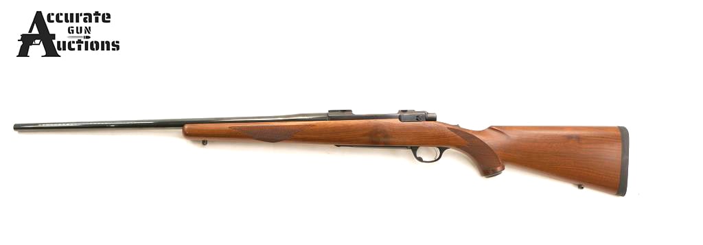 Ruger M77 .264 Win Mag: Make: Ruger Model: M77 Caliber: .264 Win Mag Action: Bolt Barrel: 24 Bore: Bright Serial # 773-19490 Condition: Very Good This Ruger M77 in .264 Win Mag. It has a deep blue finish, heavy barrel, a