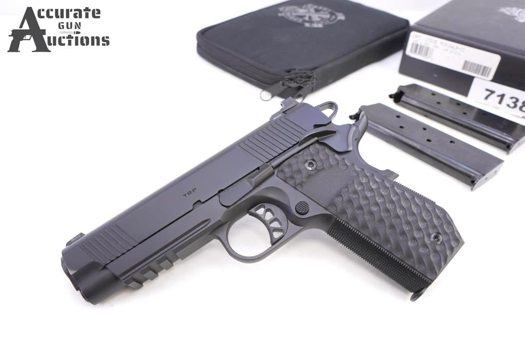 SPRINGFIELD ARMORY TRP .45 Auto: Make: SPRINGFIELD ARMORY Model: TRP Caliber: .45 Auto Action: Semi Barrel: 4.25 Bore: Bright Serial # LW195194 Condition: Very Good The Springfield Armory TRP Carry Contour 1911 in .45 ACP is a battle