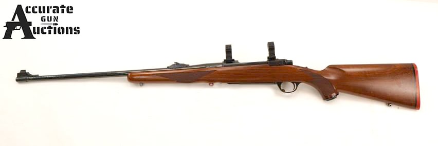 Ruger M77 7mm REM MAG: Make: Ruger Model: M77 Caliber: 7mm REM MAG Action: Bolt Barrel: 24 Bore: Bright Serial # 71-41466 Condition: Very Good This Ruger M77 in .7mm Rem Mag. It has a beep blue finish, a factory checkered