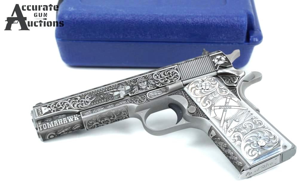 Colt 1911 Government MKIV Engr: Make: Colt Model: 1911 Government MKIV Engr Action: Semi Barrel: 5 Bore: Bright Serial # GV081512 Condition: Excellent Rare Collectable Colt 1911 Custom fully engraved stainless Tomahawk. This
