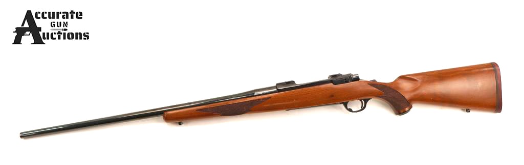 Ruger M77 25-06 Rem: Make: Ruger Model: M77 Caliber: 25-06 Rem Action: Bolt Barrel: 24 Bore: Bright Serial # 73-11453 Condition: Good This Ruger M77 in .25-06 Rem. It has a deep blue finish, heavy barrel, a factory checke