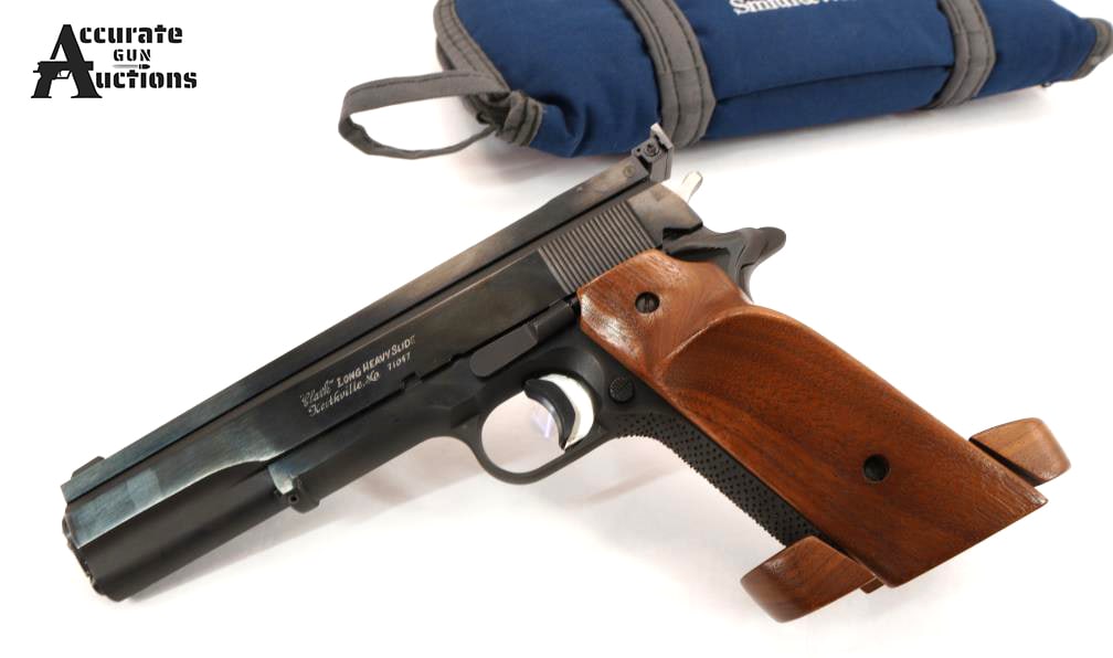 CLARK LONG HEAVY SLIDE 45 ACP: Make: CLARK Model: LONG HEAVY SLIDE Caliber: 45 ACP Action: Semi Barrel: 6 Bore: Bright Serial # FG82821 Condition: Very Good Built on a custom modified 1988 Colt series 70 Government Model 1911