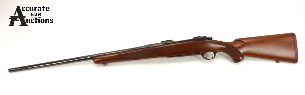 Ruger M77 .300 Win Mag: Make: Ruger Model: M77 Caliber: .300 Win Mag Action: Bolt Barrel: 24 Bore: Bright Serial # 771-38321 Condition: Very Good This Ruger M77 in .300 Win Mag. It has a deep blue finish, a factory
