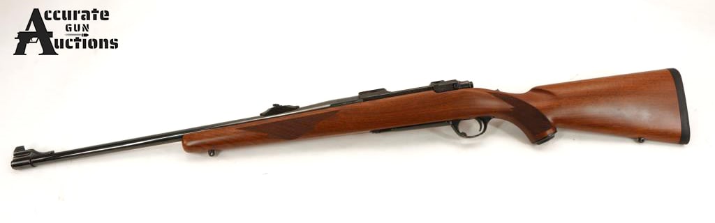 Ruger M77 .284 Win: Make: Ruger Model: M77 Caliber: .284 Win Action: Bolt Barrel: 22 Bore: Bright Serial # 72-55123 Condition: Very Good This Ruger M77 in .284 Win. It has a beep blue finish, a factory checkered walnut s