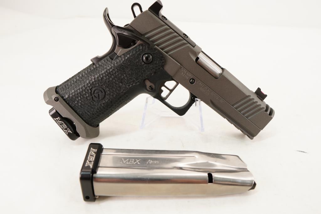 Cosaint Arms COS21 9MM: Make: Cosaint Arms Model: COS21 Caliber: 9MM Action: Semi Barrel: 4 Bore: Bright Serial # J0033 Condition: Excellent The Cosaint Arms COS21 is a high-performance double-stack 1911 (2011-style) pistol 