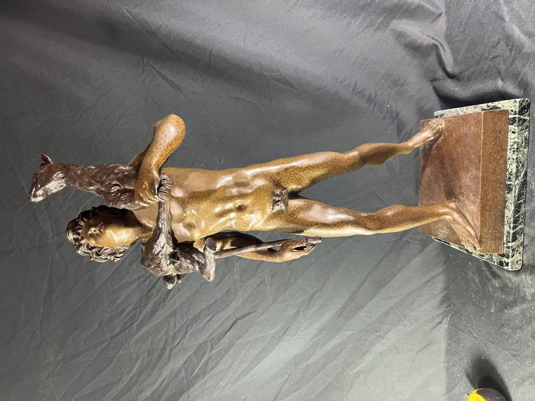 Antique French Bronze Sculpture by Picault: After a model by Pierre. Lepautre (1659-1744) Polychromed and patinated on a green marble base. Young Fawn, holding a shepherds crook with a lamb around his shoulders. The fawn wears a laurel wreath o