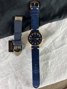 Mido Ocean Star Brand New Watch with original band and additional suede band: Automatic. Rose Gold Case. Blue Dial and Blue Bezel. Box and Papers. Retail Tag. Original Rose Gold Stainless Steel Band Never Worn Incl. 43 mm Brand new watch. One scratch due to band replacement.