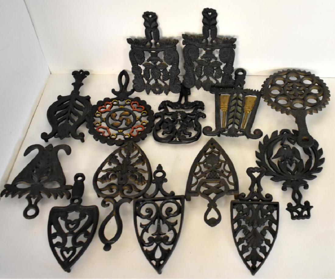 VINTAGE CAST IRON TRIVETS (1 of 4)