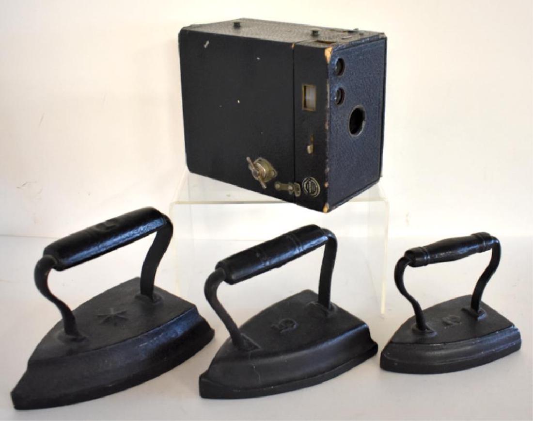 THREE ANTIQUE IRONS & BROWNIE BOX CAMERA (1 of 5)