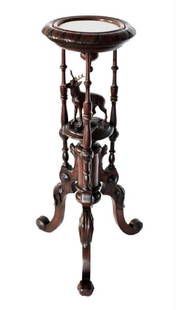 VICTORIAN STAG CARVED WALNUT PLANT STAND: Circa 1880s walnut plant stand features a fully carved stag on the pedestal and a white marble top. It measures 37" tall x 12" across at the top (19" across at the feet) and appears to be in very