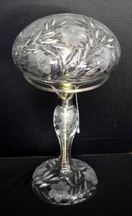 ANTIQUE PAIRPOINT CUT GLASS LAMP: Circa 1920s mushroom style cut and etched glass lamp is topped with a matching dome-shaped shade. Lamp stands 18" tall x 10" across.