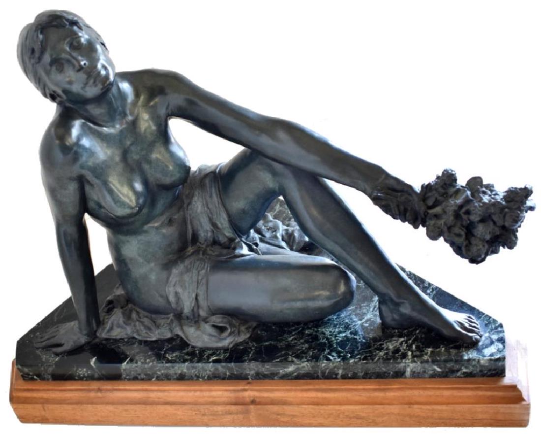 VILEM ZACH "LILAC" LIMITED EDITION BRONZE: An original bronze by Western artist Vilem Zach (Czech/Canadian, born 1946). Statue is signed and numbered 19/36. It depicts a seated nude woman holding a bouquet of lilacs. Measures 13" tall x 21" wi