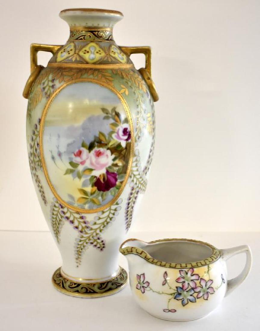TWO PIECES OF NIPPON PORCELAIN: Includes a Nippon vase with finely done gold work and Nippon creamer. The vase measures 11" tall and has been drilled for a lamp. Both pieces appear to be in nice overall condition with some signs of 