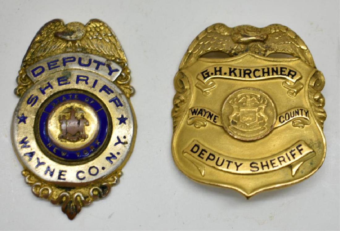 TWO WAYNE COUNTY, NY DEPUTY SHERIFF BADGES: Includes a Deputy Sheriff Wayne County, NY (missing the fastener on the back) and a badge belonging to G.H. Kirchner, Deputy Sheriff Wayne County (made by Weyning Bros. Mfg. Co., Detroit). Both badges