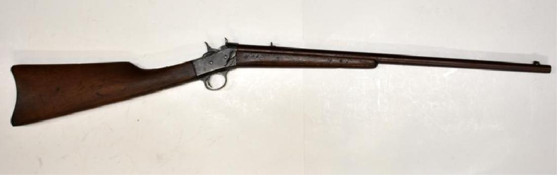 ANTIQUE REMINGTON ROLLING BLOCK RIFLE: Remington rolling block .22 caliber rifle has a 21" barrel with walnut stock.