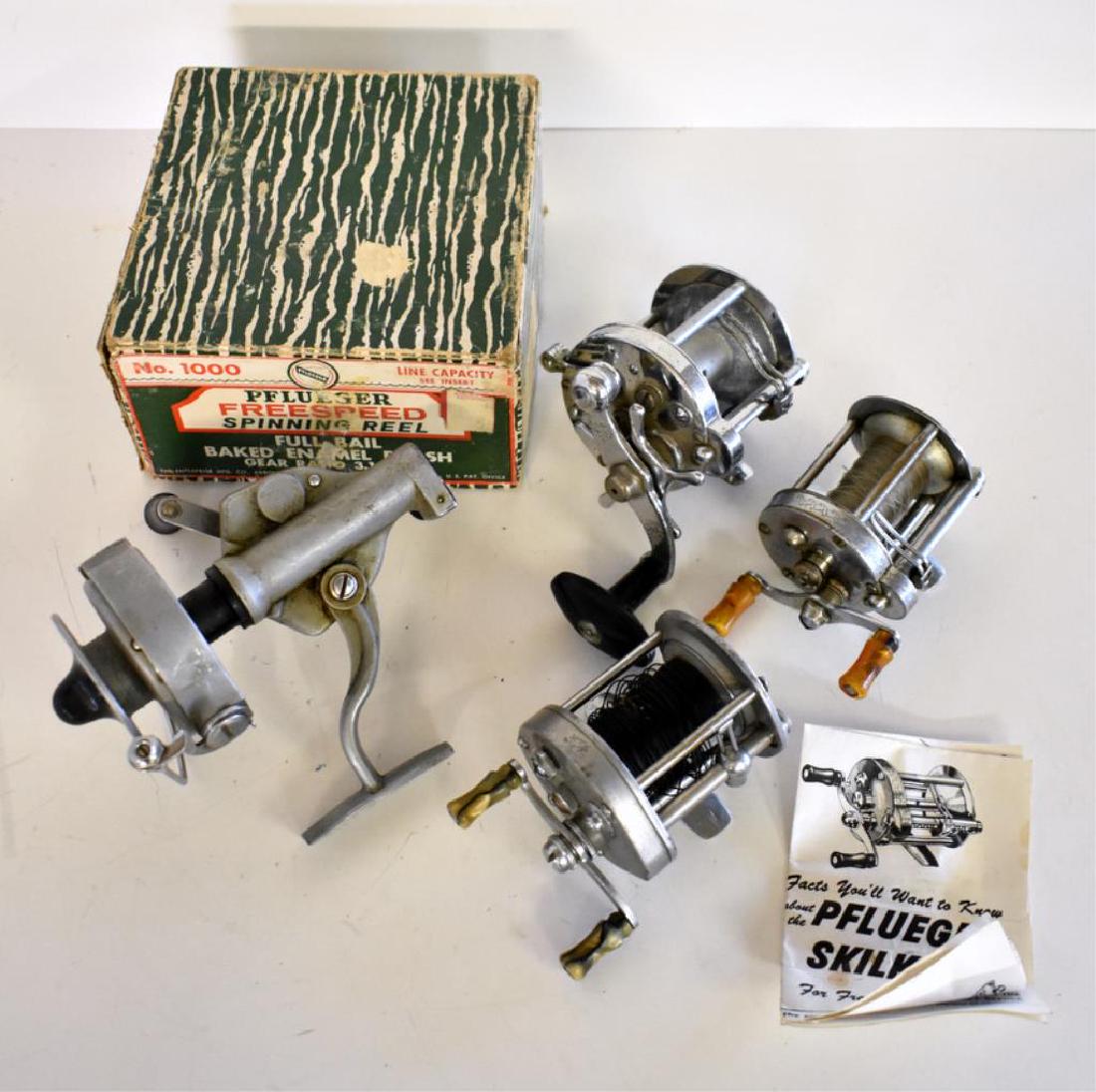 FIVE VINTAGE PFLUEGER FISHING REELS