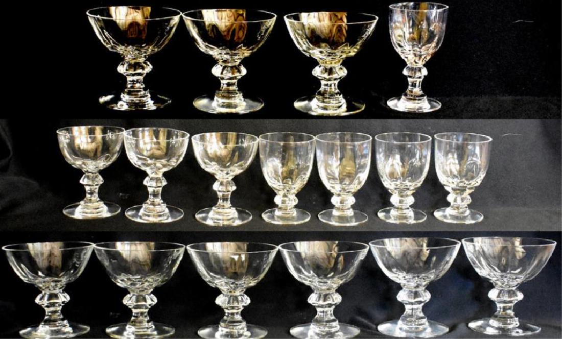HEISEY CRYSTOLITE GLASSWARE: Includes nine champagne glasses, four small wine glasses, three cocktail glasses and a single wine glass all in the Heisey "Crystolite" pattern. Two of the glasses have chips.