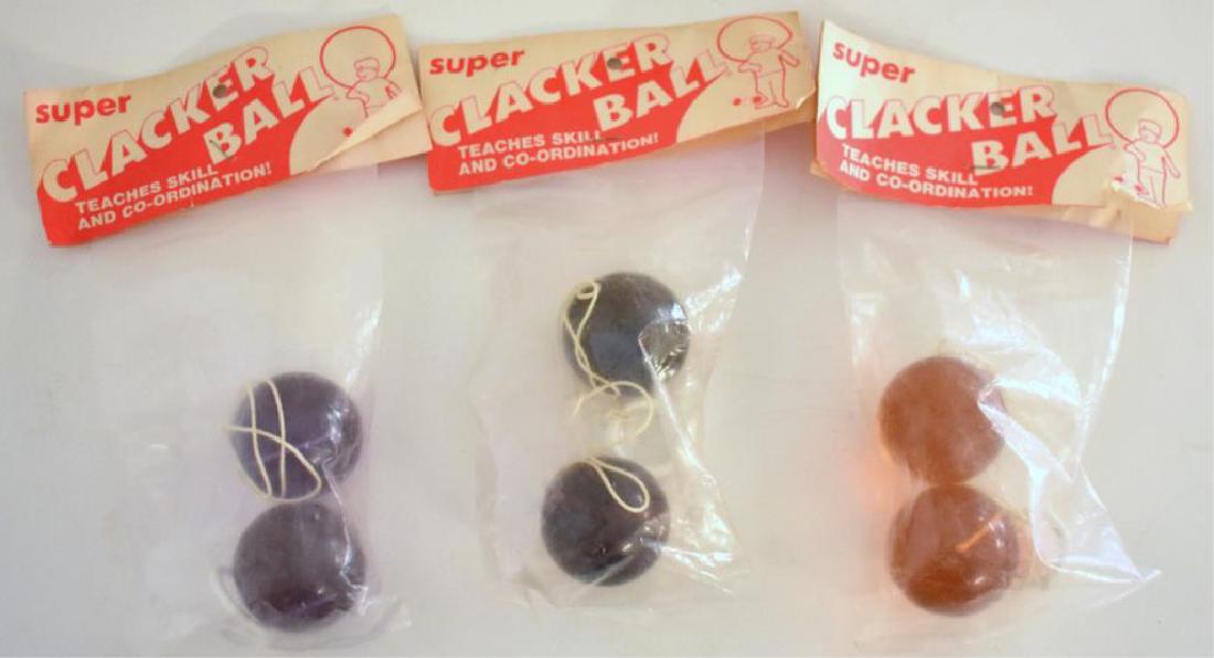 THREE VINTAGE SUPER CLACKER BALLS (NOS): Three circa 1970 Super Clacker Ball toys are unopened in the original packaging.