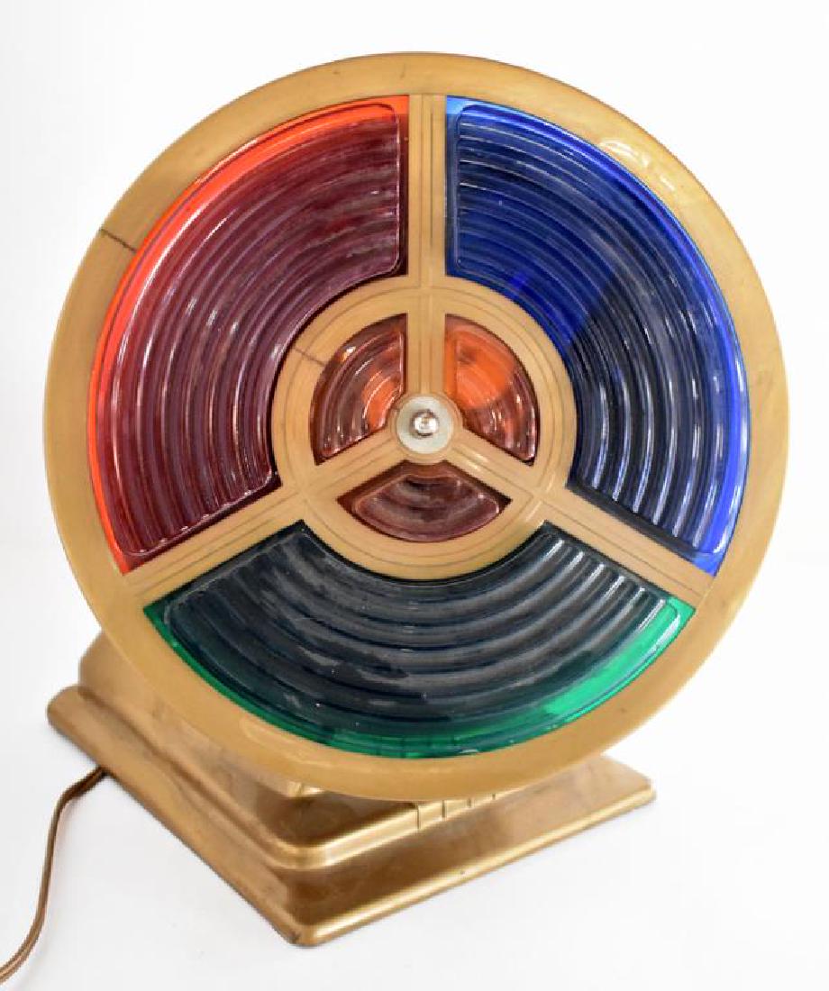 VINTAGE CHRISTMAS COLOR WHEEL: Vintage Christmas tree color wheel lights up but does not rotate. It measures 12" across.