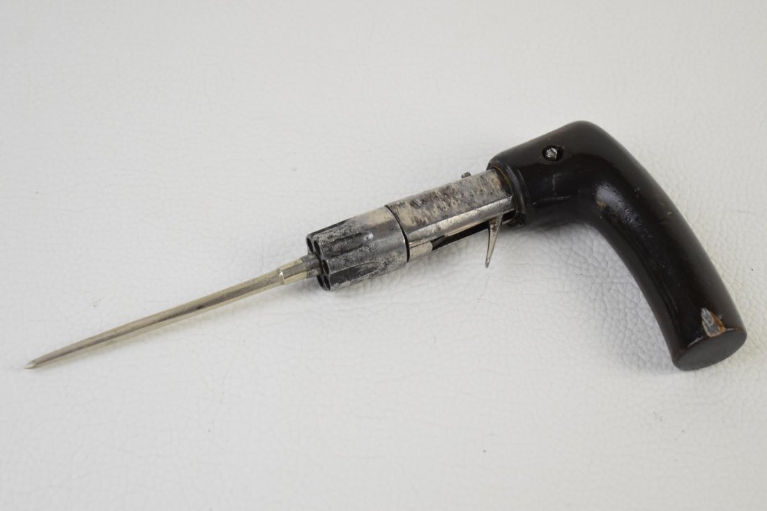 PEPPERBOX PISTOL CONCEALED GUN CANE: Antique French walking cane features concealed six-shot rimfire pepperbox pistol with stiletto blade, circa 1850-1900. 34" long.