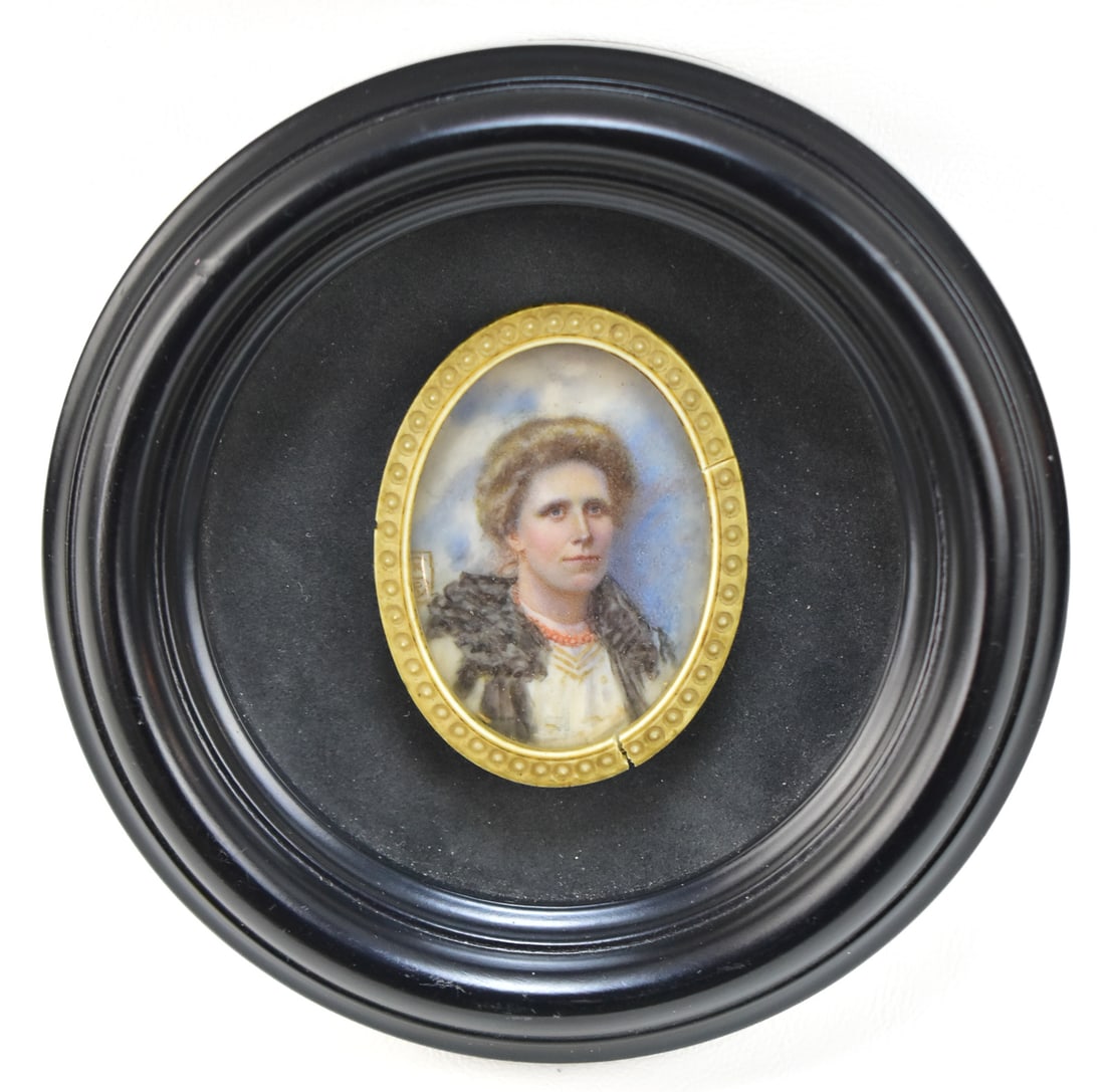 LADY PORTRAIT MINIATURE ON BONE FRAME: Portrait miniature of a lady in a circular bone shadowbox frame, circa 19th century. Signed "S.R.R.". Measures 5" diameter. 