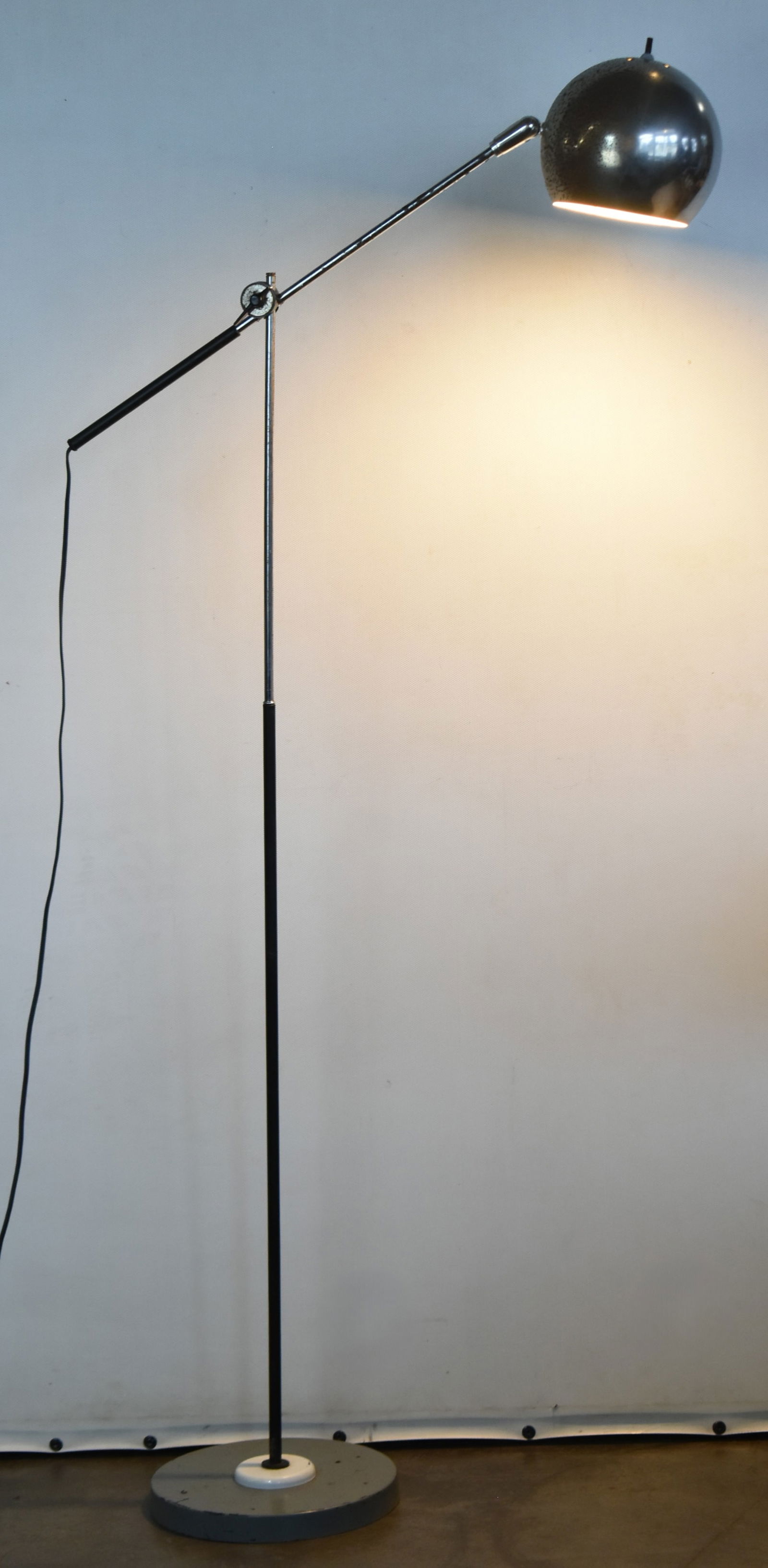 ROBERT SONNEMAN (ATTR.) MIDCENTURY MODERN CHROME ORBITAL 'EYBALL' FLOOR LAMP: Midcentury modern chrome adjustable orbital "eyeball" lamp attributed to Robert Sonneman, circa 1960s.