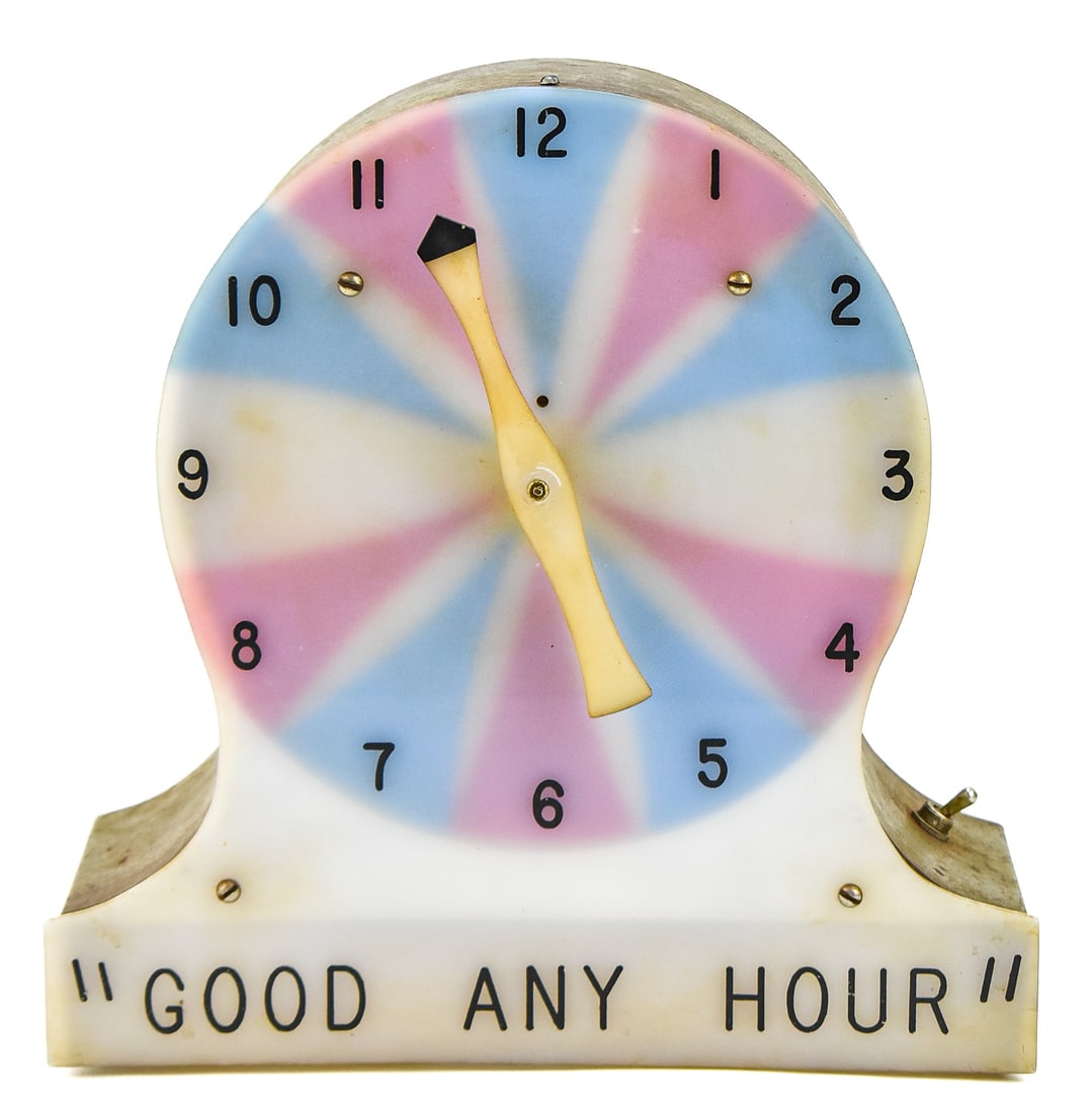 HAYDON MFG. CO. MIRACLE ELECTRIC MANTEL CLOCK: Haydon Manufacturing Company Incorporated ‘Miracle’ electric "Good Any Hour" mantel clock with white plastic front, wooden case, prize wheel patterned face circa 1930 - 1940s.