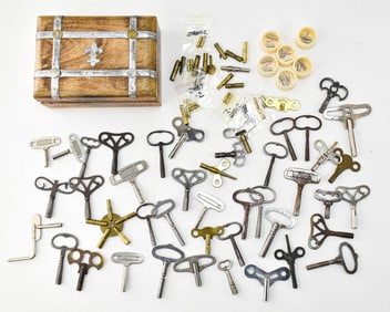 COLLECTION OF WINDING KEYS & OAK TRINKET BOX