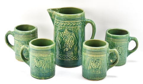 NELSON MCCOY GREEN GLAZED STONEWARE BEER STEIN SET OF 4 AND PITCHER
