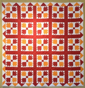 ANTIQUE 'BEAR PAW' QUILT