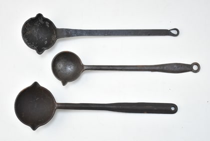 THREE ANTIQUE IRON SMELTING LADLES