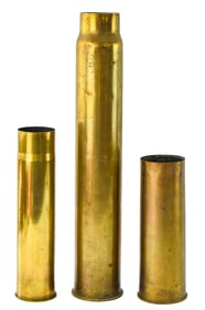 THREE WWI-WWII ERA ARTILLERY SHELL CASINGS