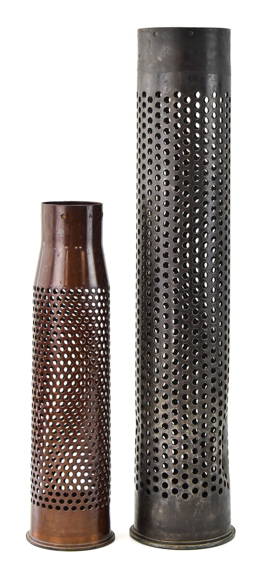 PAIR OF US MILITARY KOREAN WAR ERA PERFORATED OR VENTILATED ARTILLERY & ANTI-TANK SHELL CASINGS: A pair of US Military perforated and ventilated artillery shell casings from the Korean War era, including one 1956 marked 106 mm M44A1 HEAT shell for the M40 recoilless anti-tank rifle, and one 1953 