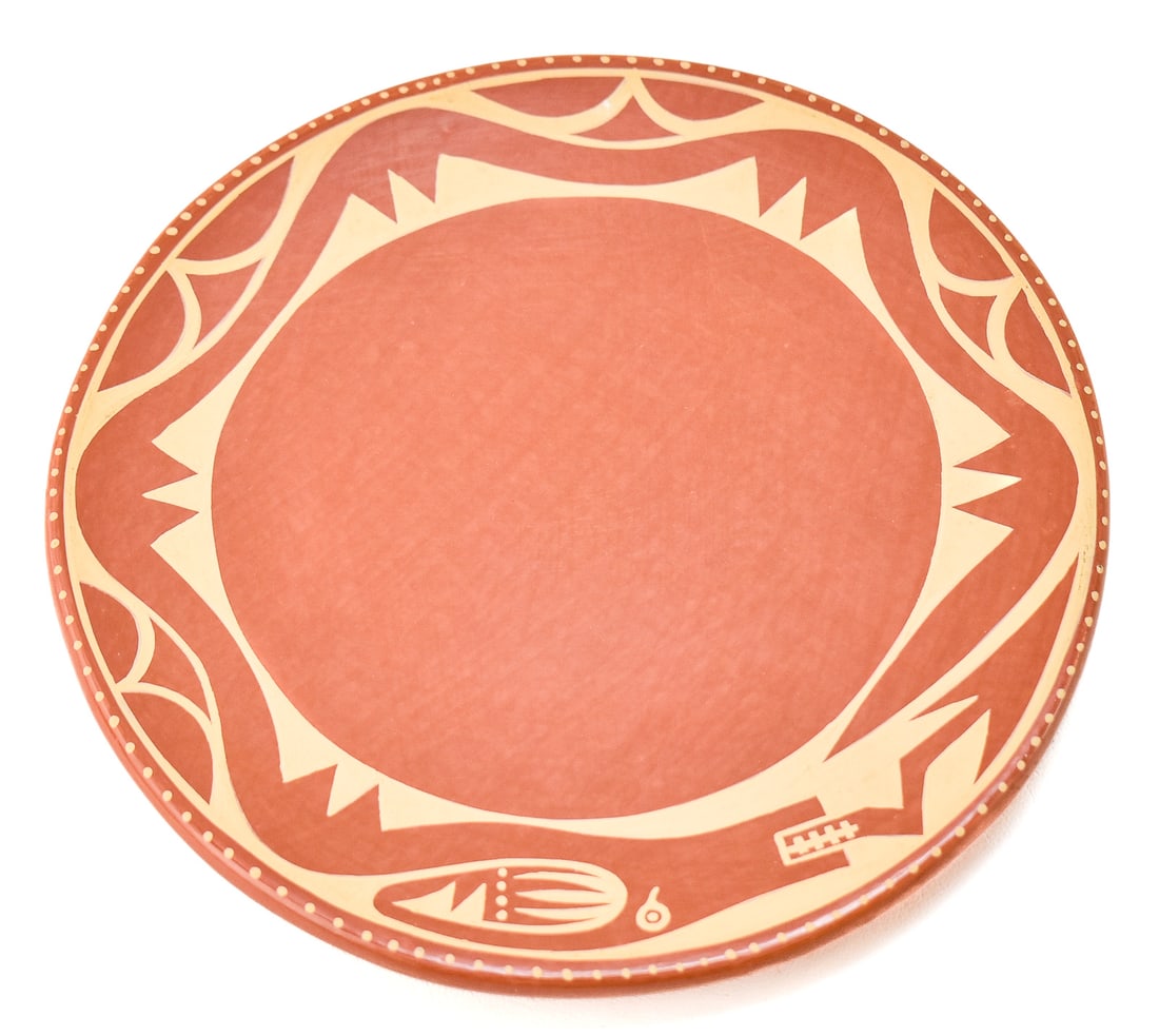 SIGNED HELEN GUTIERREZ POTTERY PLATE: Signed hand-painted red pottery plate by listed artist Helen Gutierrez of San Ildefonso Pueblo, circa 1930-1995. The plate measures 9.75 inches in diameter.