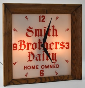 SMITH BROTHERS DAIRY ILLUMINATED WALL CLOCK