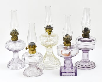ASSORTED LAVENDER & CLEAR PATTERN GLASS MINIATURE OIL LAMPS