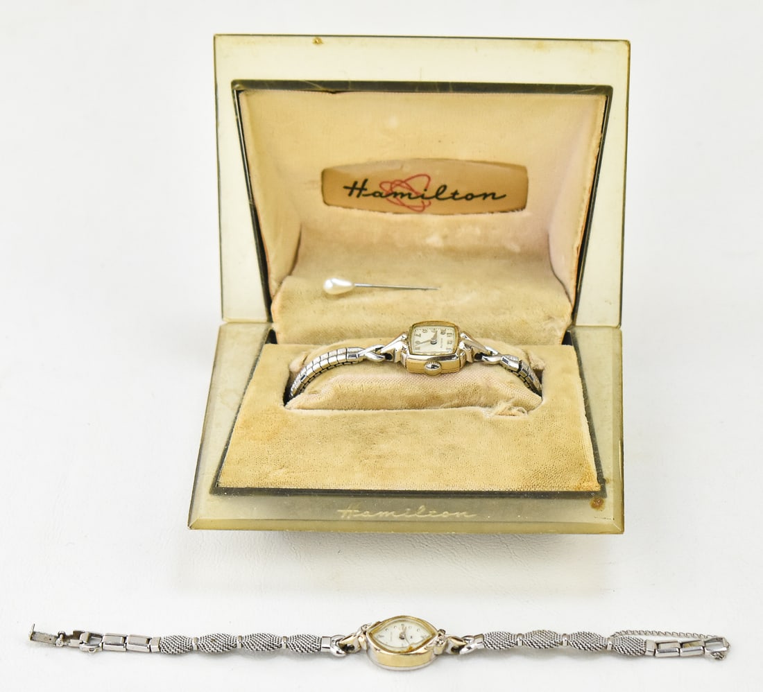 PAIR OF HAMILTON WRISTWATCHES: A 10K Gold-Filled Hamilton ladies wristwatch with case, and a 10K White Gold Hamilton ladies wristwatch with a 10K Gold-Filled watch band. Circa 1950's.
