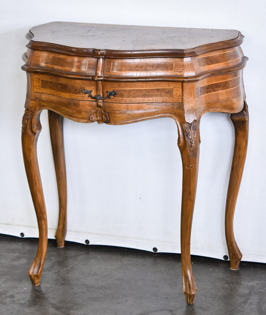 VENETIAN FRUITWOOD & BURL CONSOLE TABLE: Venetian fruitwood and burl console table with lift-top storage compartment and single drawer, circa turn of the 19th century. Measures 25.5" H x 23" W x 13.5" D.