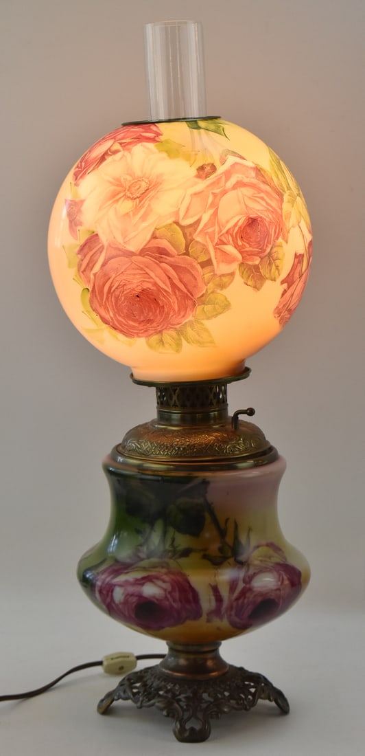 MERIDEN GONE WITH THE WIND LAMP: An antique Meriden brass electrified Gone With the Wind style table lamp with floral glass shade and font. Measures 24.5" H.