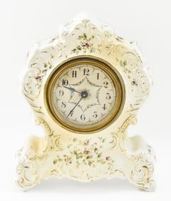 PORCELAIN FLORAL MANTEL CLOCK, CIRCA EARLY 20TH CENTURY