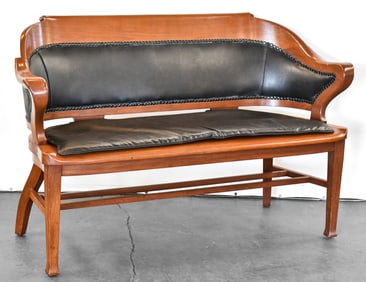 CHERRY RAILROAD STATION BENCH WITH LEATHER UPHOLSTERY; EARLY 1900S