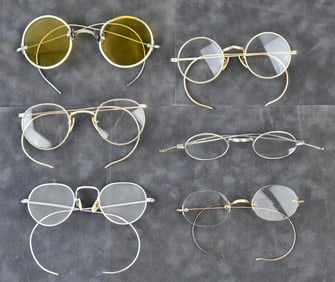 FIVE PAIRS OF SILVER-TONE EYEGLASSES; TURN OF THE 19TH CENTURY