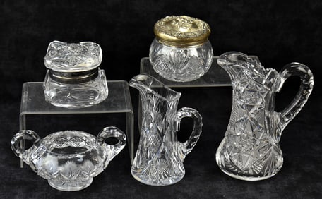 FIVE PIECES OF CUT GLASS: PITCHERS, DRESSER BOXES & MORE