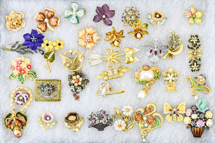 COLLECTION OF JOAN RIVERS BROOCHES