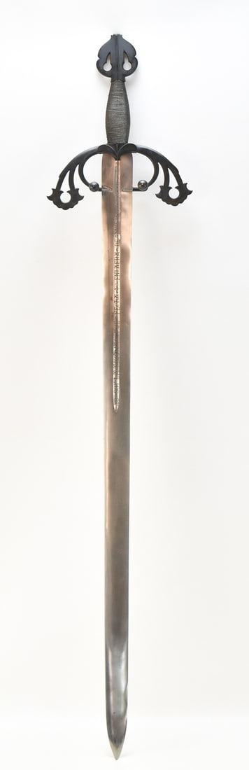 EL CID 'LA TIZONA' DECORATIVE REPLICA SWORD: A 40" long replica sword of "La Tizona", owned by Rodrigo Diaz de Vivar, "El Cid", famous Spanish knight of the 11th century. The inscription reads, "I am Tizona, who was made in the year one thousand