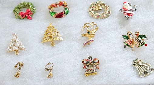 COLLECTION OF CHRISTMAS THEMED RHINESTONE & ENAMEL BROOCHES