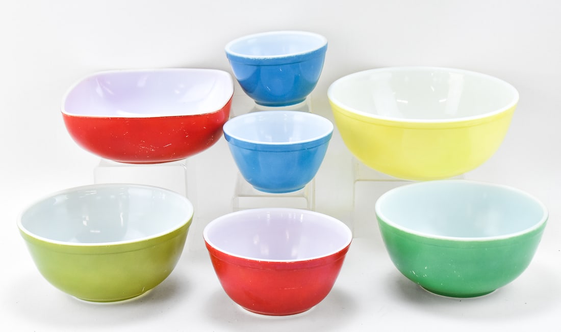 VINTAGE PYREX OVENWARE MULTI-COLORED BOWLS: This lot includes the following Pyrex Ovenware bowls, circa 1940-1960: blue bowl No. 401 31, red bowl No. 402 A27, olive-colored bowl No. 403 25, yellow bowl No. 404 11 (10.5" diameter), two unmarked